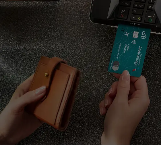 American Airlines AAdvantage® MileUp® Card inserted into payment terminal during grocery shopping